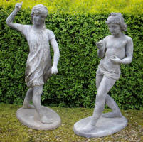 pair of lead figures throwing darts and stones