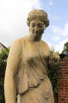 Antique Stoneware Garden Maiden